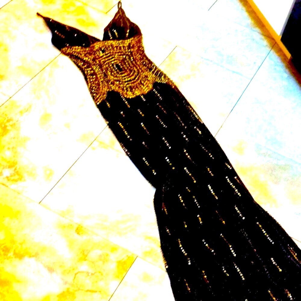 - Unique eye catching Cache evening gown